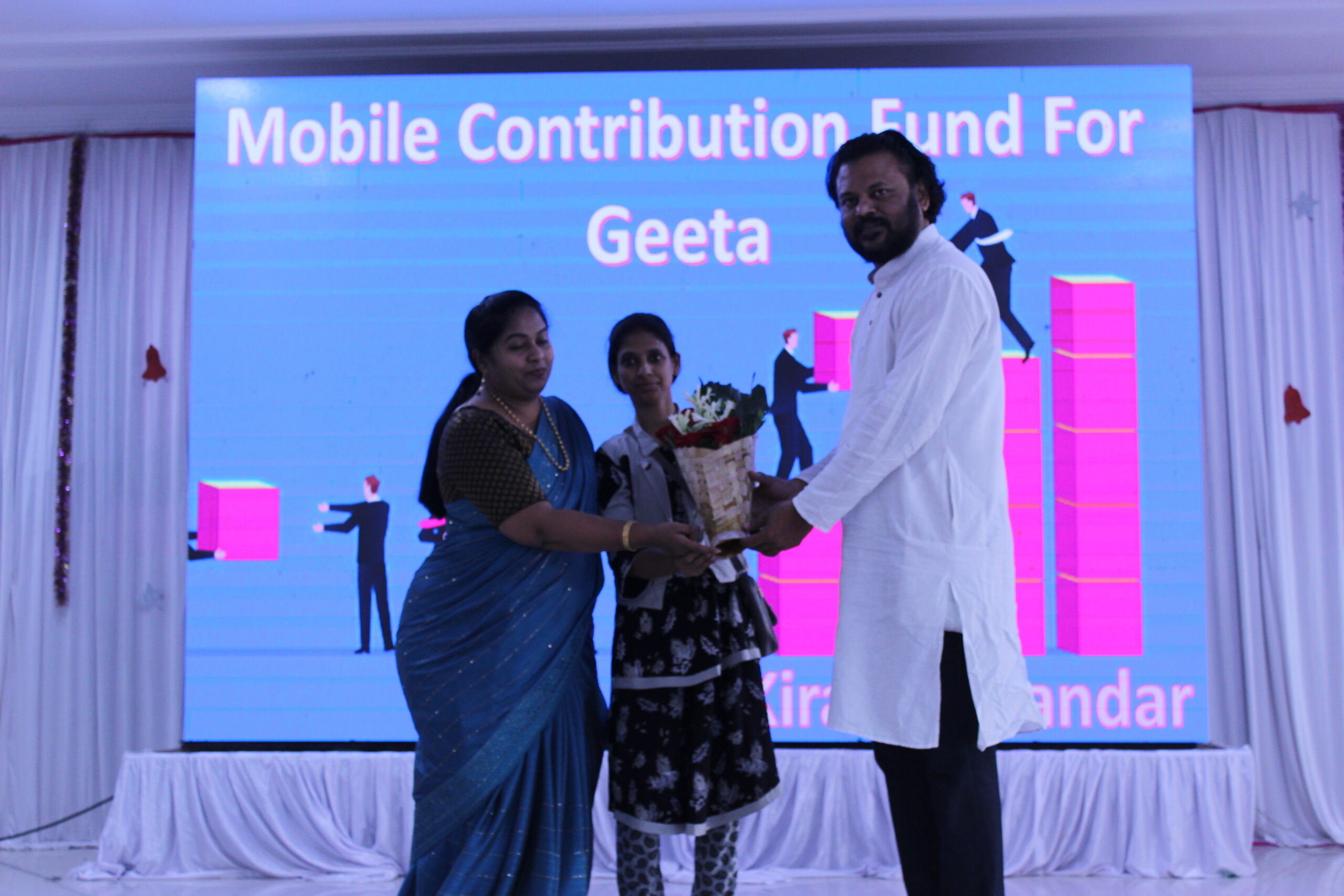 People gathered for a contribution fund event for Geeta